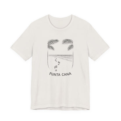 Hand-Drawn Sketch of footprints in sand leading to the ocean, framed by palm fronds in charcoal ink, with 'PUNTA CANA' written in the sand, evoking a personal beach walk.